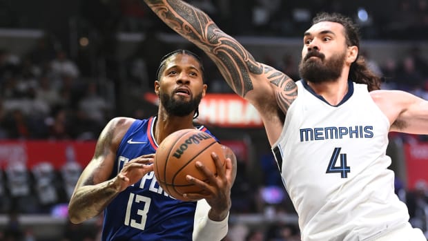 Grizzlies center Steven Adams (4) defends a shot by Clippers guard Paul George (13) in the second half at Staples Center.